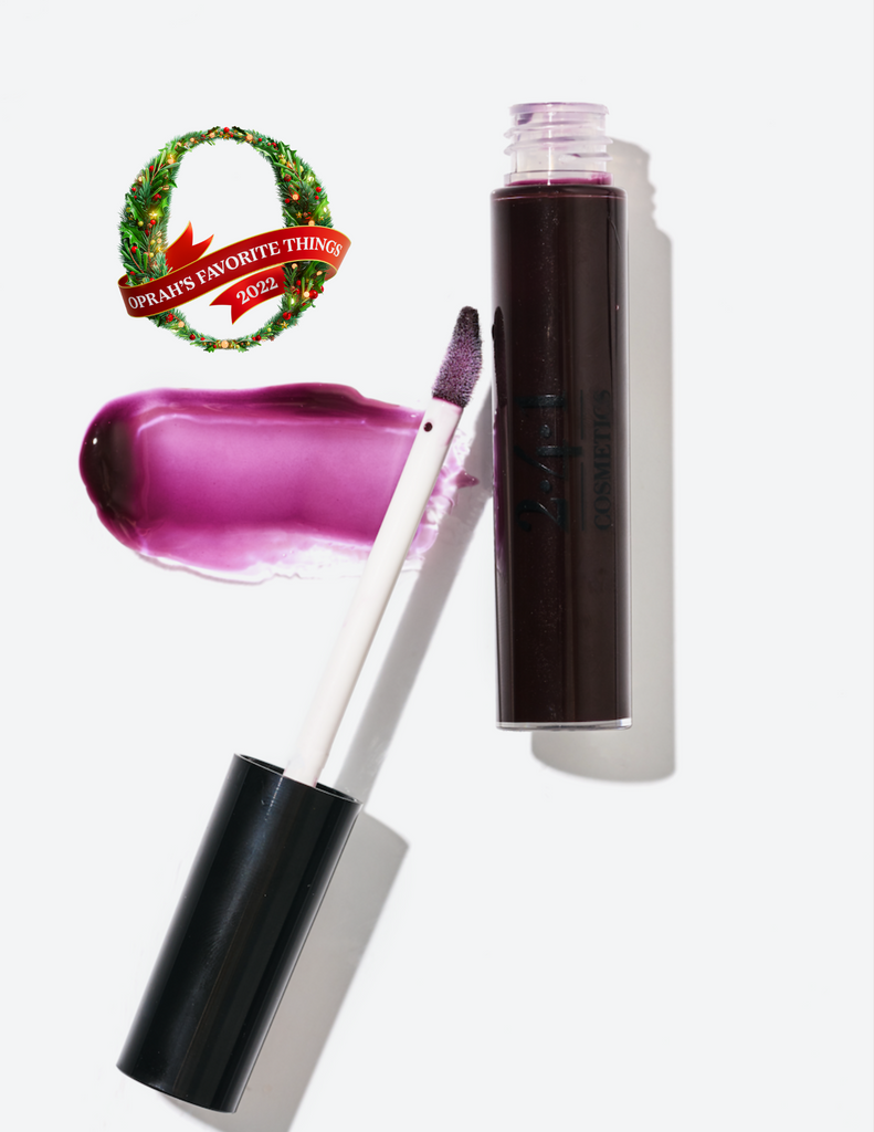 Moisturizing and glittering sheer plum lip gloss